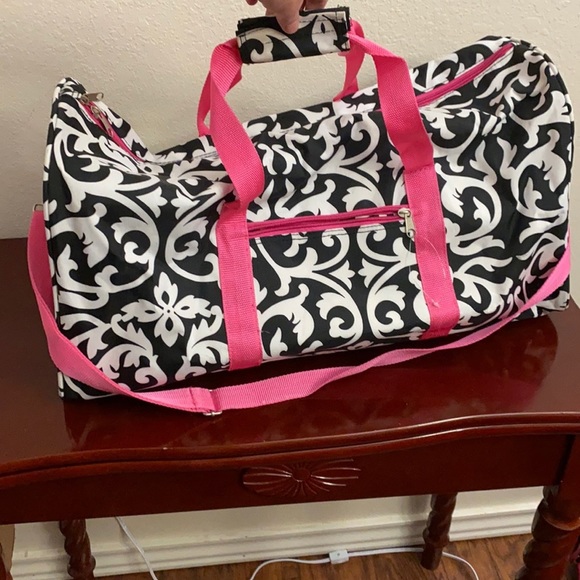 Handbags - A Paisley Duffel Bag the colors are White with black paisley and pink straps!